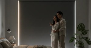 Modern Asian couple enjoying privacy with blackout roller blinds installation by Ministry of Blind
